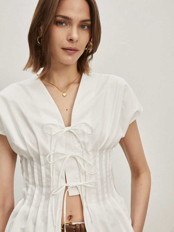 LOVEVVR Cotton Pleated Knotted Blouse